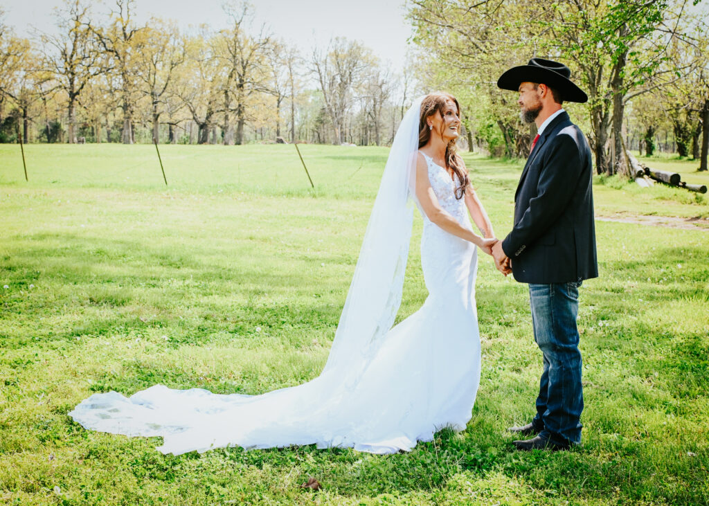  Bride and groom on the five-acre property at Country Charm, featuring our Wedding Venue FAQs