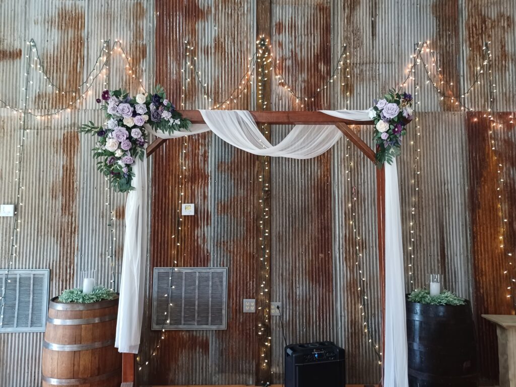 Collaborative wedding reception setup with lavender and sage green decor