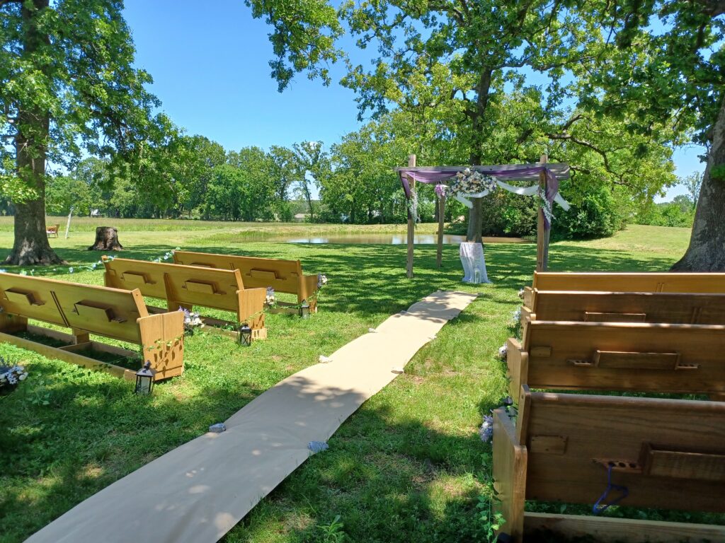 Outdoor pond side wedding ceremony styling at Country Charm Venue