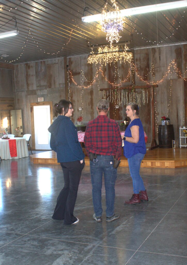 Jackie meeting with engaged couples during a wedding venue tour