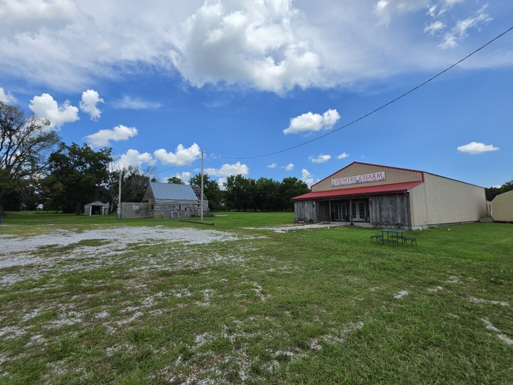 Parking lot and reception hall at Country Charm Event Venue near Neosho, Missouri